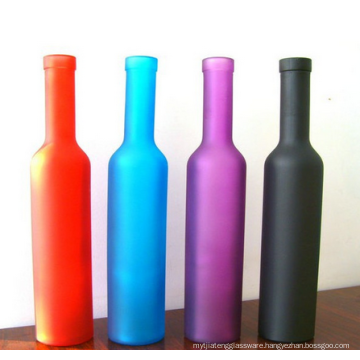 Colored frosted glass wine bottle.